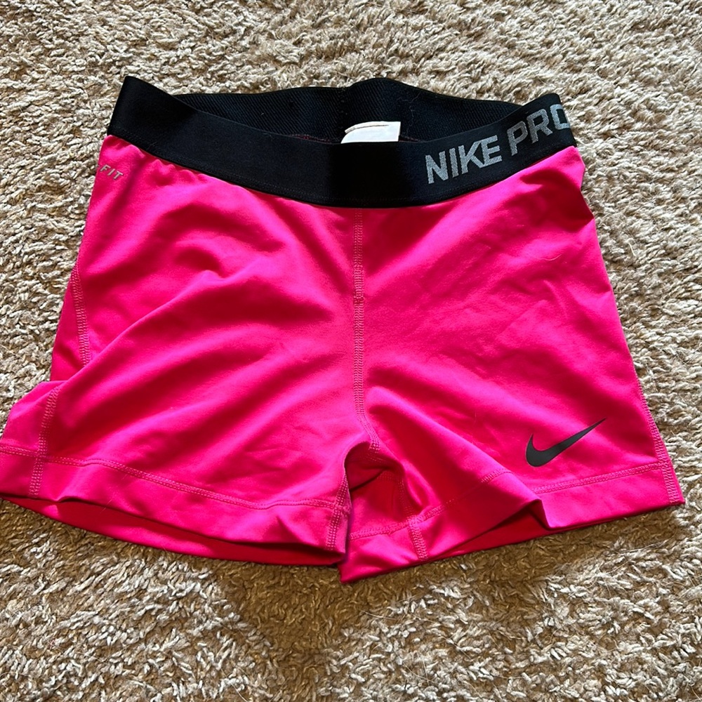Bright pink Nike spandex